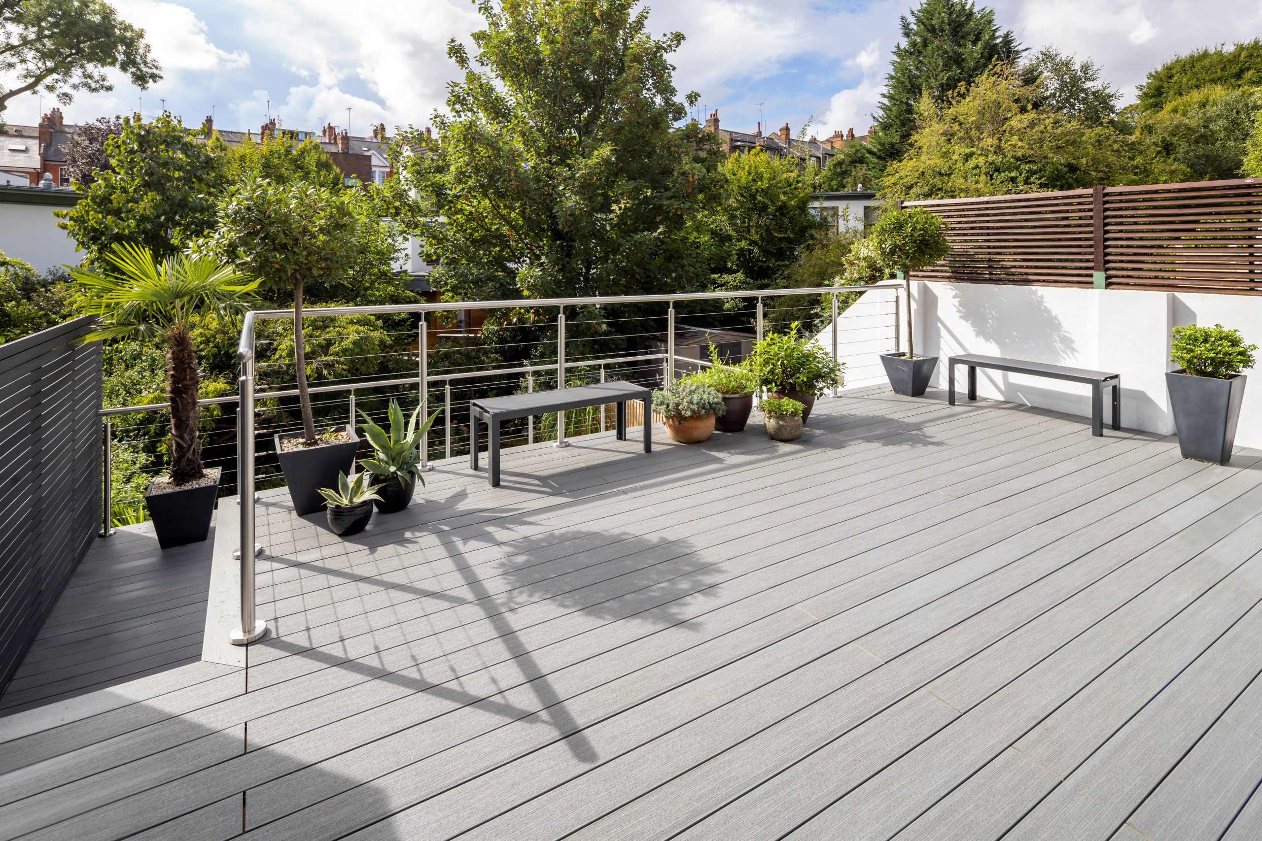 grey composite millboard decking staircase with grey composite screens and steel balustrade